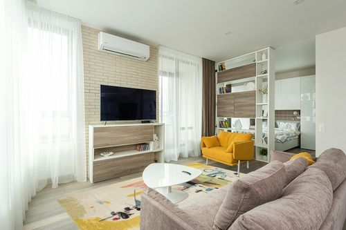 COLORWRKS Sunny Pastels Abstract Area Rug in Yellow Orren Ellis Rug Size ... in Light Modern Living Room with TV