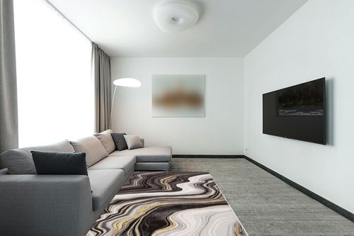 Well Woven Werrick Grey & Gold Striated Marble Pattern Area Rug (5'3" x 7'3") in Modern Living Room with Grey Couch