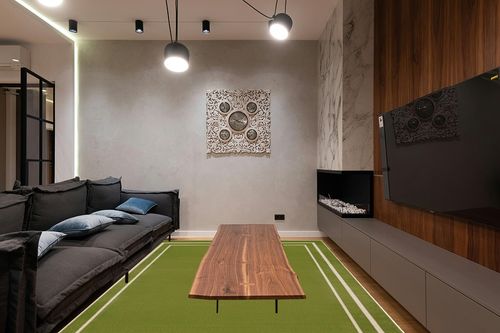 Nourison Essentials Indoor/Outdoor Solid Bordered Green Ivory 8' x 10' Area Rug, Easy Cleaning, Non Shedding, Bed Room, Living Room, Dining Room, Backyard, Deck, Patio (8x10) in Dark Wood Living Room with Black Couch