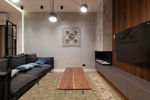 Superior Indoor Area Rug, Jute Backed Rugs for Bedroom, Living/Dining Room, Office, Kitchen, Traditional Floral Scroll Floor Decor, Heritage Collection, Green, 9' x 12' in Dark Wood Living Room with Black Couch