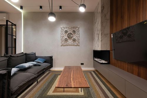 SAFAVIEH Braided Collection Area Rug - 8' x 10', Multi, Handmade Country Cottage Reversible, Ideal for High Traffic Areas in Living Room, Bedroom (BRD308A) in Dark Wood Living Room with Black Couch