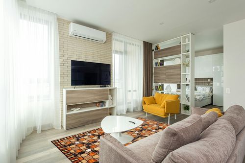 SAFAVIEH Aspen Collection Area Rug - 5' x 8', Light Yellow & Orange, Handmade Boho Wool, Ideal for High Traffic Areas in Living Room, Bedroom (APN128D) in Light Modern Living Room with TV