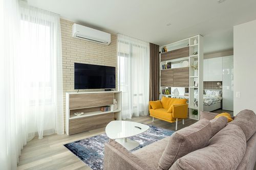 Blue Bohemian Stain Resistant Living Room Area Rug in Light Modern Living Room with TV