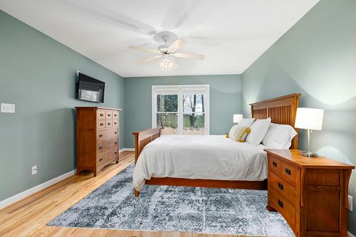 HOMBYS 9x12 Modern Area Rug for Living Room Bedroom, Large Boho Floor Carpet with Non-Slip Backing for Indoor Office Dining Room, Abstract Home Deco Non-Shedding, Green, Machine Washable in Teal and Orange Wood Bedroom