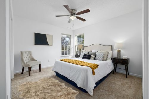 Nouvelle Legende® Faux Fur Sheepskin Premium Rug Quattro (43 in. X 73 in.) Tan in White and Yellow Modern Bedroom