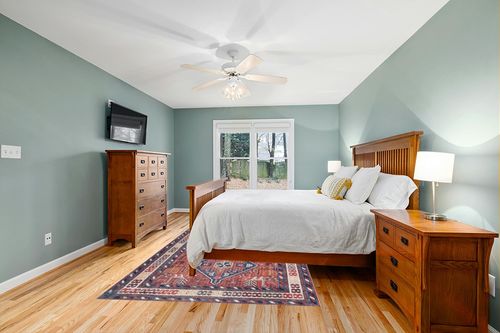 nuLOOM Stella Machine Washable Traditional Tribal Area Rug, 6x9, Rust in Teal and Orange Wood Bedroom