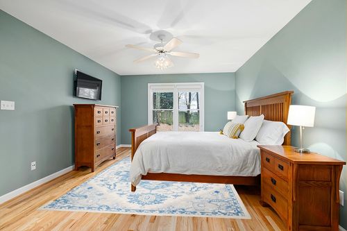 SAFAVIEH Micro-Loop Collection Area Rug - 8' x 10', Ivory & Blue, Handmade Shabby Chic Medallion Wool, Ideal for High Traffic Areas in Living Room, Bedroom (MLP503G) in Teal and Orange Wood Bedroom