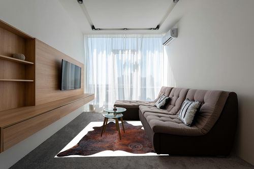 Genuine Brindle Dark Reddish Cowhide Rug XL Size 6 x 7-8 ft. 180 x 240 cm in Grey Living Room with Brown Couch