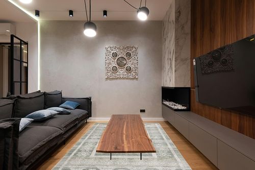 SAFAVIEH Marquee Collection Area Rug - 6' x 9', Green & Sage, Handmade, Ideal for High Traffic Areas in Living Room, Bedroom, Dining (MRQ108Y-6) in Dark Wood Living Room with Black Couch