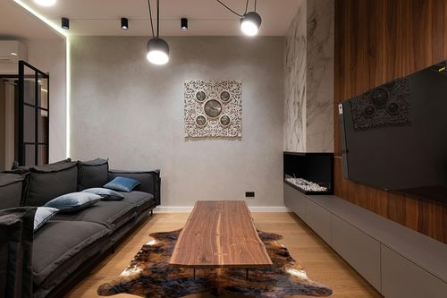 bonanza leathers Genuine Cowhide Rug Dark Brindle Size S/L/XL 5X6/6X7/7X8 FT (6x7) in Dark Wood Living Room with Black Couch