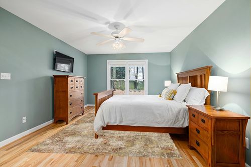 GENIMO Washable Area Rugs for Living Room Bedroom, 8x10 Modern Abstract Non Slip Rug, Low Pile Soft Contemporary Indoor Floor Carpet Cover for Dinning Room Kitchen, Orange in Teal and Orange Wood Bedroom