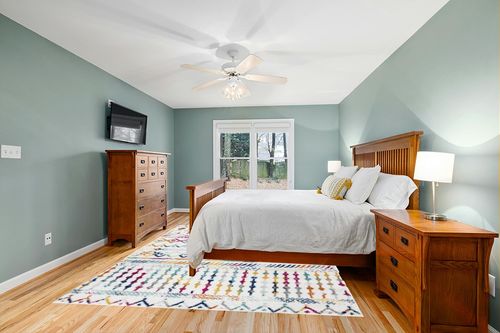 Antep Rugs Bohemian 8x10 Geometric Indoor Area Rug Phoenix, 7'10" x 10', Multi in Teal and Orange Wood Bedroom