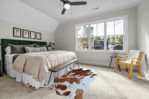 rugoo Premium Brown Cowhide Rug 6.4 ft x 8.5 ft Faux Cowhide Rug Cow Print Rug Faux Animal Skin Rug for Living Room Bedroom Nursery Western Decor in Grey Traditional Bedroom with King Bed