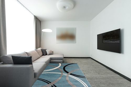 Rugshop Modern Wavy Circles Design Area Rug 5' 3" x 7' 3" Blue in Modern Living Room with Grey Couch