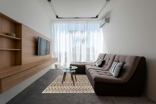 Geometric Cream/Orange Area Rug Dakota Fields Rug Size: Rectangle 5'3" x 7' in Grey Living Room with Brown Couch