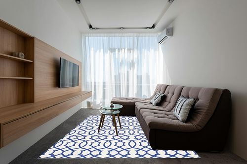 SAFAVIEH Dhurries Collection 8' x 10' Ivory / Purple DHU753B Handmade Flatweave Premium Wool Area Rug in Grey Living Room with Brown Couch