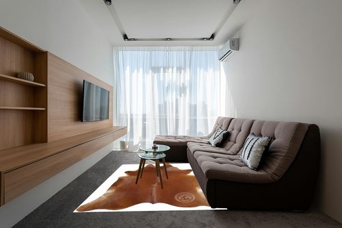 Genuine Brown Cowhide Rug 6 x 7-8 ft. 180 x 220 cm in Grey Living Room with Brown Couch