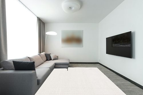 SAFAVIEH Natura Collection Area Rug - 8' x 10', Ivory, Handmade Solid Wool, Ideal for High Traffic Areas in Living Room, Bedroom (NAT801A) in Modern Living Room with Grey Couch