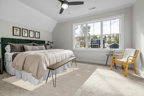 Valetta Abstract Beige Area Rug Isabelle & Max Rug Size: Rectangle 7'10" x 10'10" in Grey Traditional Bedroom with King Bed