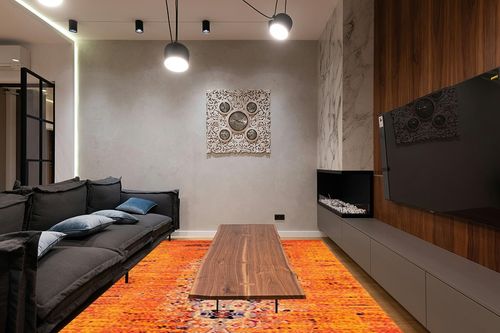 SAFAVIEH Monaco Collection Area Rug - 8' x 10', Orange & Multi, Modern Boho Abstract Distressed Design, Non-Shedding & Easy Care, Ideal for High Traffic Areas in Living Room, Bedroom (MNC209H) in Dark Wood Living Room with Black Couch