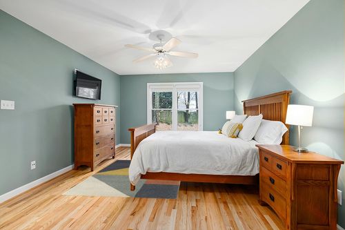 Amancia Mustard Modern Geometric Shag Area Rug Wade Logan Rug Size: Rectangle 5'3 ... in Teal and Orange Wood Bedroom