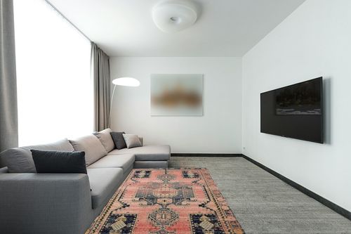 Loloi II Jocelyn Collection JOC-06 Rose/Rose 5'-5" x 7'-6" Area Rug in Modern Living Room with Grey Couch