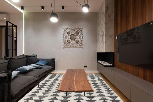 JONATHAN Y MOH206A-8 Aisha Moroccan Triangle Geometric Indoor Farmhouse Area-Rug Bohemian Minimalistic Easy-Cleaning Bedroom Kitchen Living Room Non Shedding, 8 X 10, Cream,Black in Dark Wood Living Room with Black Couch