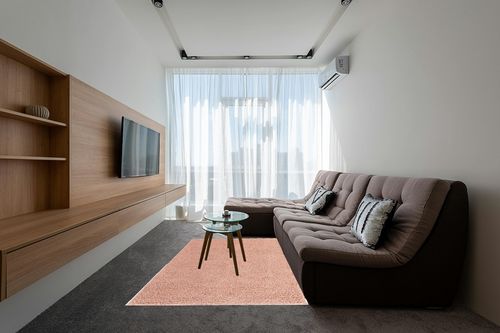 Everyday Shag Rug Pink in Grey Living Room with Brown Couch