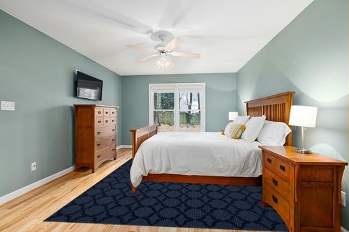 Garland Rug Sparta Area Rug, 9' x 12', Navy CL100N10814410 in Teal and Orange Wood Bedroom