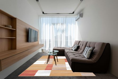 SUPERIOR Clifton Mid-Century Modern Geometric Polypropylene Indoor Area Rug with Jute Backing, 8' X 10', Ginger in Grey Living Room with Brown Couch