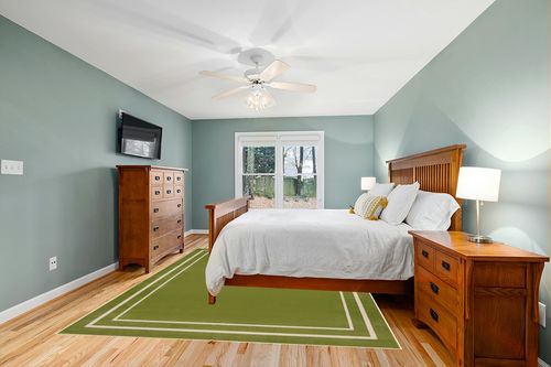 Nourison Essentials Indoor/Outdoor Solid Bordered Green Ivory 8' x 10' Area Rug, Easy Cleaning, Non Shedding, Bed Room, Living Room, Dining Room, Backyard, Deck, Patio (8x10) in Teal and Orange Wood Bedroom