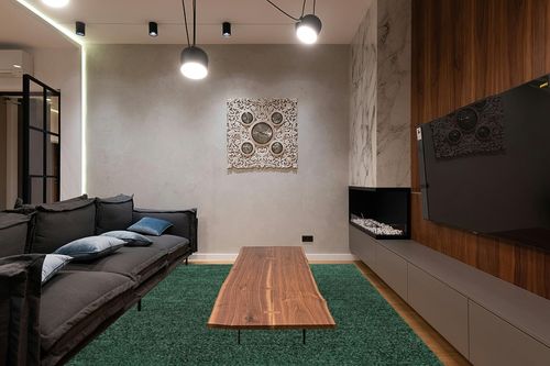 JONATHAN Y SEU100L-8 Haze Solid Low-Pile Indoor Area-Rug Casual Contemporary Solid Traditional Easy-Cleaning Bedroom Kitchen Living Room Non Shedding, 8 ft x 10 ft, Emerald in Dark Wood Living Room with Black Couch