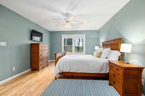 Rustic Tales Opulent Wool Area Rug, 4' x 6' Flat Woven Rug, Soft Texture, Handmade, Indoor Rug for Bedroom, Living Room, Dining Room, Kitchen, Hallway - Crafted in India (Lt Blue) in Teal and Orange Wood Bedroom