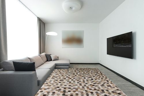 Blackamoor Leather Hide Patchwork Area Rug Handmade Cowhide Contemporary Multi Grey Style (8'x10' ft) in Modern Living Room with Grey Couch