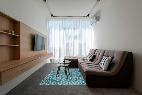 Wonnitar Moroccan Machine Washable Area Rug in Grey Living Room with Brown Couch