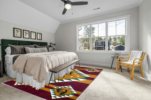 AllStar Rugs Red 8x10 Tribal Area Rug (7' 7" x 10' 6") in Grey Traditional Bedroom with King Bed
