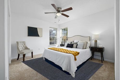 SAFAVIEH Braided Collection Area Rug - 8' x 10', Black, Handmade Farmhouse, Ideal for High Traffic Areas in Living Room, Bedroom (BRA201Z) in White and Yellow Modern Bedroom