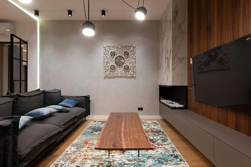 SAFAVIEH Madison Collection Area Rug - 6' x 9', Grey & Blue, Modern Abstract Design, Non-Shedding & Easy Care, Ideal for High Traffic Areas in Living Room, Bedroom (MAD471F) in Dark Wood Living Room with Black Couch