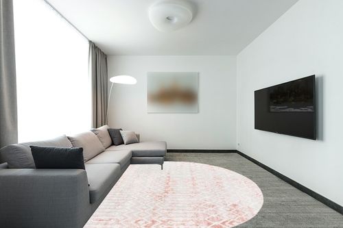 Unique Loom Bohemian Trellis Collection Area Rug - Gypsy (8' x 10' Oval, Dusty Rose/Ivory) in Modern Living Room with Grey Couch