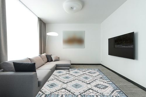 Safavieh Kilim Collection Area Rug - 8' x 10', Ivory & Blue, Handmade Tribal Boho Rustic Wool, Ideal for High Traffic Areas in Living Room, Bedroom (KLM329A) in Modern Living Room with Grey Couch