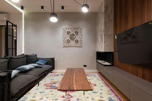 Antep Rugs Elite 8x10 Vintage Bohemian Distressed Oriental Medallion Indoor Area Rug (Pink, 7'10" x 10') in Dark Wood Living Room with Black Couch