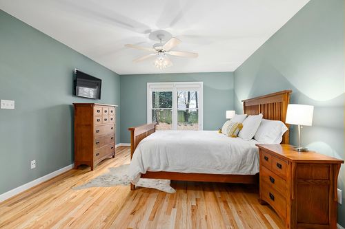 LAKKH Fourtue 4.2x6ft Faux Cowhide Rug - Synthetic Cow Hide Rug - Cowhide Rug Faux - Cowhide Rugs for Living Room Bedroom & Home Office - Plush Synthetic Fur w/ Soft Backing (Gold & Cream) (L-02) in Teal and Orange Wood Bedroom