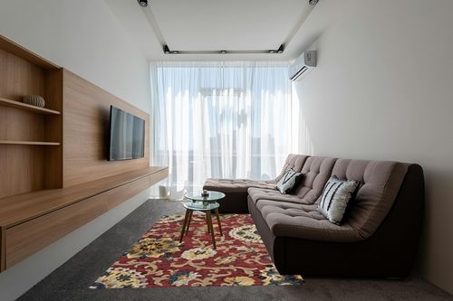 SAFAVIEH Blossom Collection 6' x 9' Red / Multi BLM401C Handmade Premium Wool Area Rug in Grey Living Room with Brown Couch