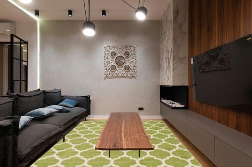 Unique Loom Trellis Collection Area Rug - Philadelphia (8'x 10' Rectangle, Light Green/ Beige) in Dark Wood Living Room with Black Couch