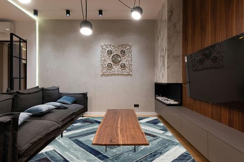 LUXE WEAVERS Modern Abstract Wood Carpet Geometric Blue 8x10 Area Rug in Dark Wood Living Room with Black Couch