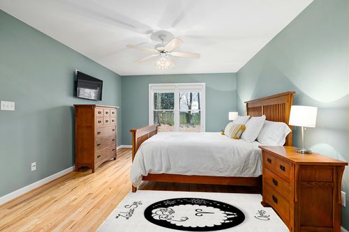 Ambesonne Zodiac Aries Area Rug, Big Black Dot with Fluffy Ram and Tribal Motifs Funny Design, Flat Woven Accent Rug for Living Room Bedroom Dining Room, 4' X 5' 7", Black and White in Teal and Orange Wood Bedroom