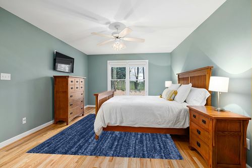 Nourison Essentials Indoor/Outdoor Navy Blue 8' x 10' Area Rug, Easy -Cleaning, Non Shedding, Bed Room, Living Room, Dining Room, Backyard, Deck, Patio (8x10) in Teal and Orange Wood Bedroom