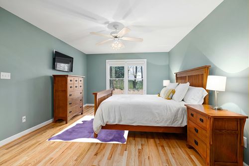 Natural Geneva Cowhide Area Rugs for Living Room and Bedroom | Handmade 100% Cow Rug with Low Pile | Shed-Resistant Home and Office Rug, Purple, 5 ft x 7 ft in Teal and Orange Wood Bedroom