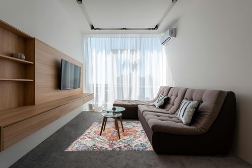Orange/Navy Traditional  Living Room Area Rug in Grey Living Room with Brown Couch