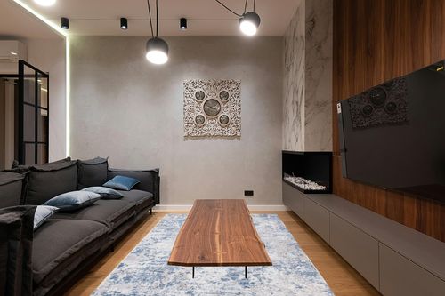 SAFAVIEH Amelia Collection Area Rug - 6' x 9', Grey & Blue, Modern Abstract Design, Non-Shedding & Easy Care, Ideal for High Traffic Areas in Living Room, Bedroom (ALA705F) in Dark Wood Living Room with Black Couch